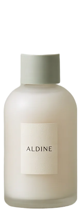 Frosted glass bottle of Still toner with a disc cap