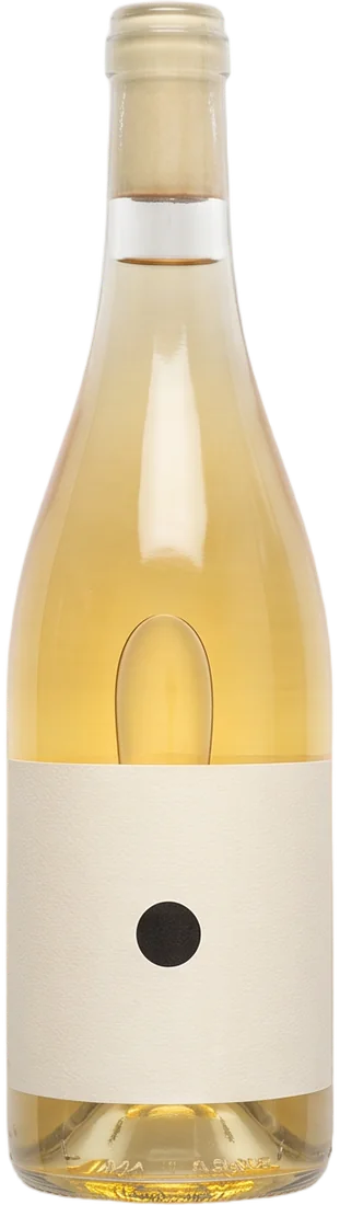A clear glass bottle of pale straw wine with a plain white label and one black circle