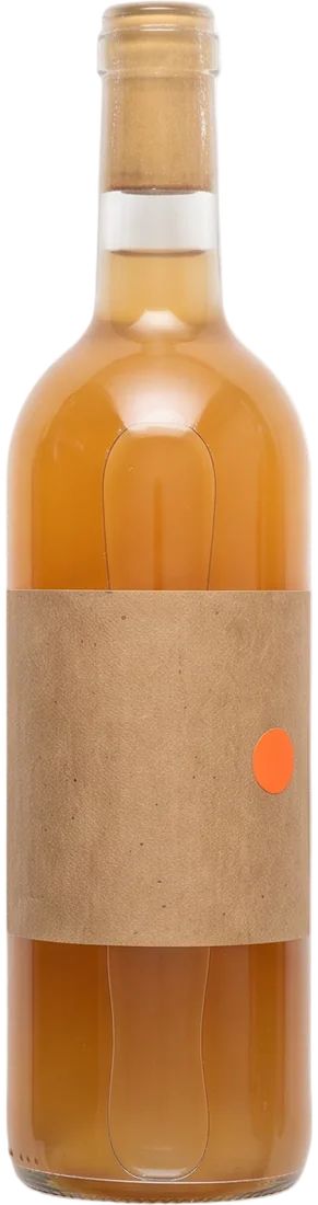 A clear glass bottle of cloudy amber-orange wine with a brown paper label and a round orange sticker