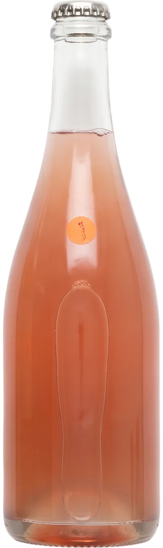 A clear sparkling-wine bottle with a crown cap and cloudy pink wine, stamped with an orange dot