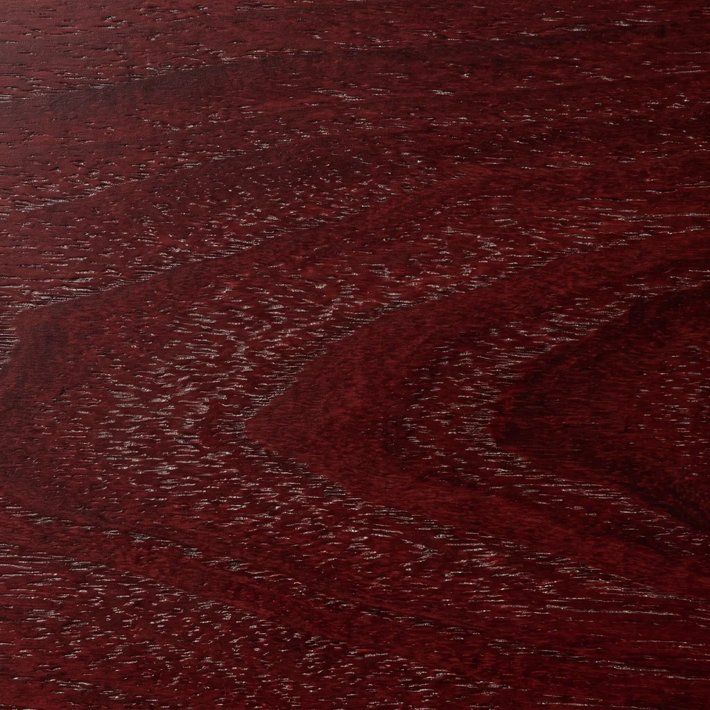 Lacewood veneer stained deep red with silvery flecks across the grain