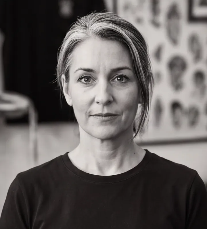 Black and white portrait of Ingrid Solheim, a fictional tattoo artist